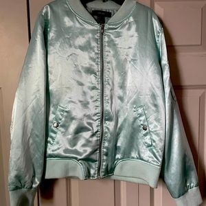 Bomber jackets, one pink and one blue